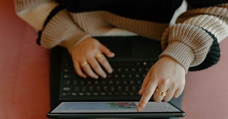 Person using a tablet and keyboard to complete a short questionnaire