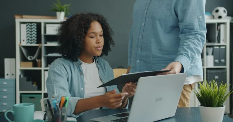Woman listening attentively to a colleague at work